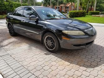 03 Mazda 6 224k mi cold air runs perfect. super reliable