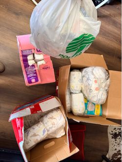 3 boxes full of diapers from New born - 3   NOT FREE !!