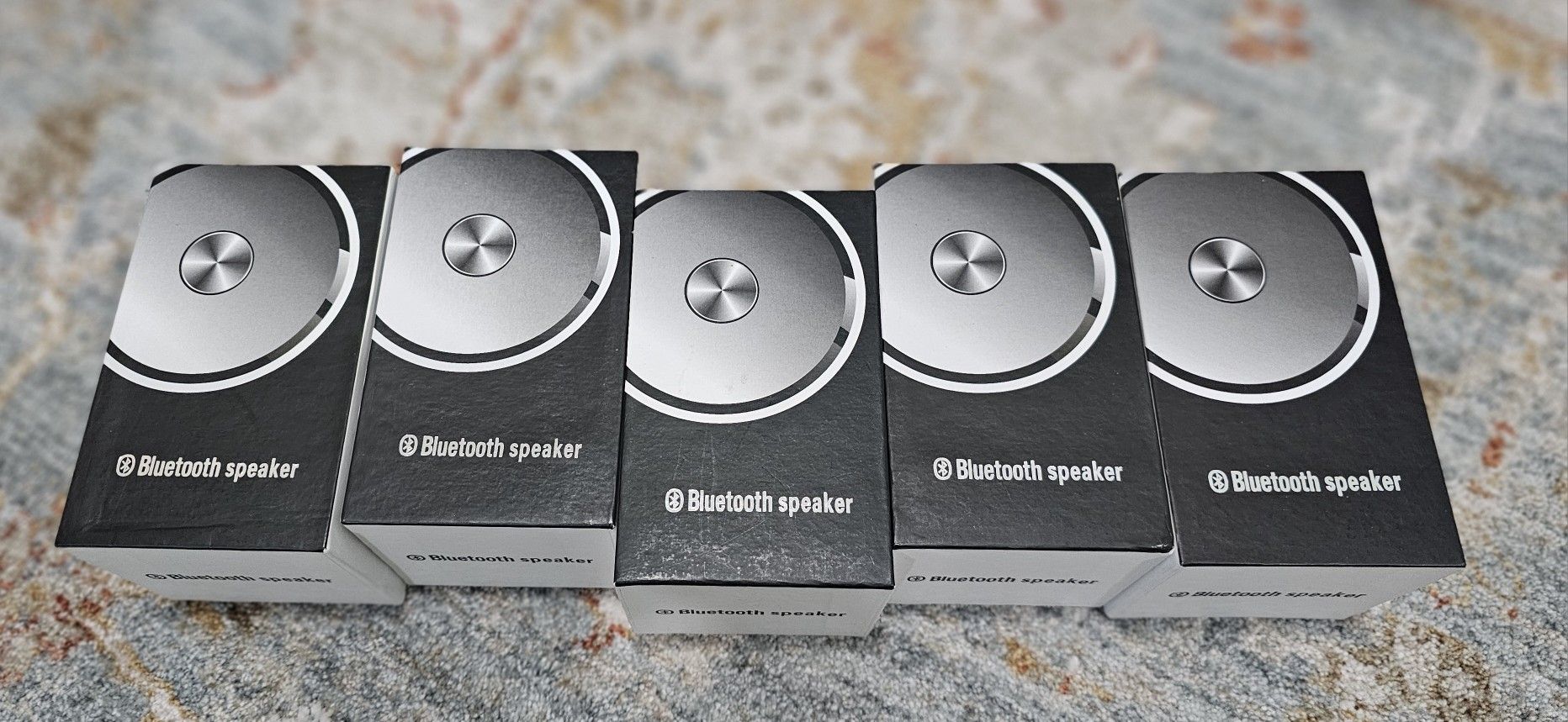 5 brand new Bluetooth and line in mini speakers for computer or phone connection.
