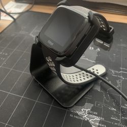 Very cool Fitbit Versa stand and charging cable (watch not included)