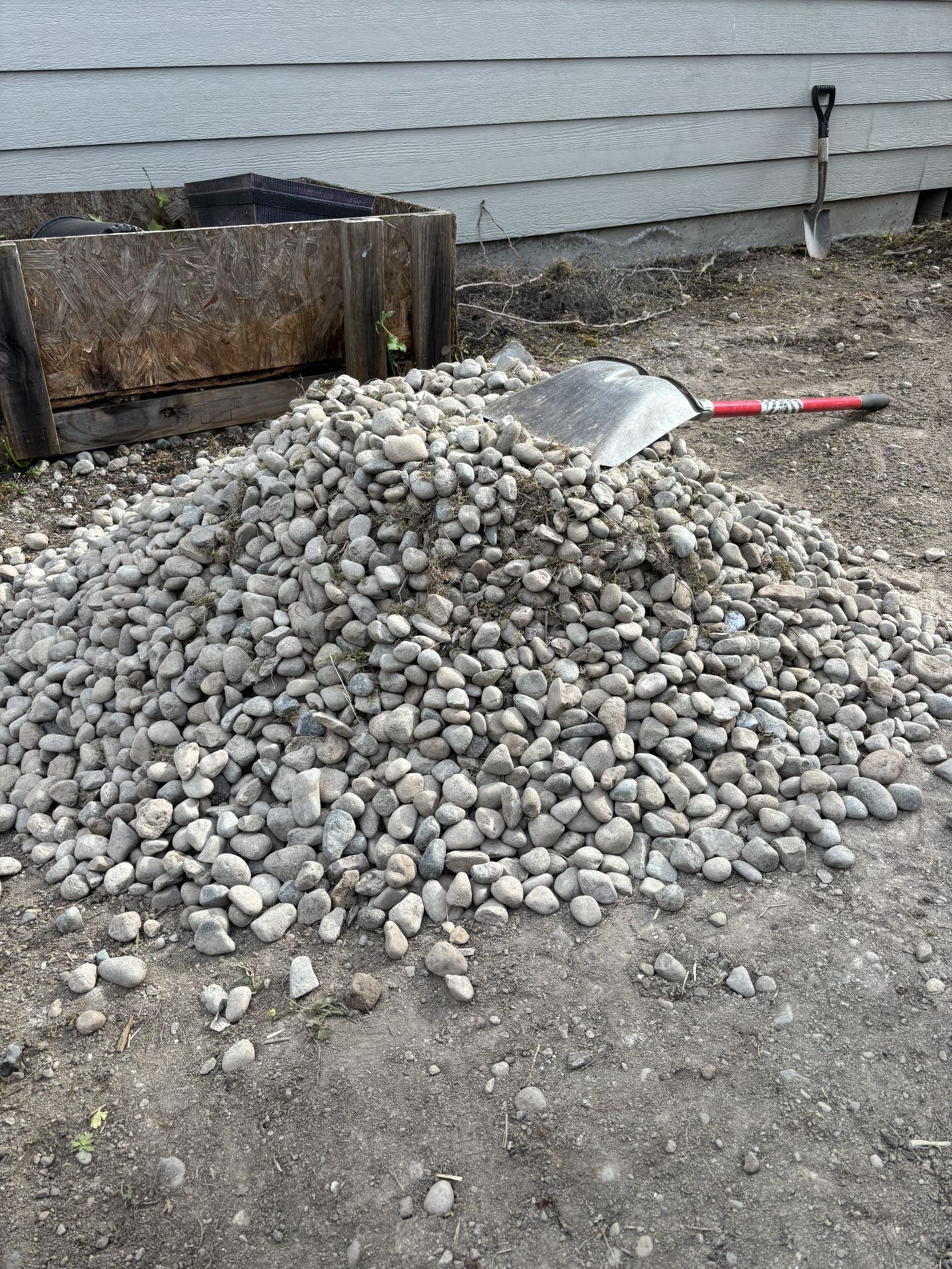 Free drainage gravel. Two piles available, same as in the photo.