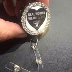 Raiders girl badge reel