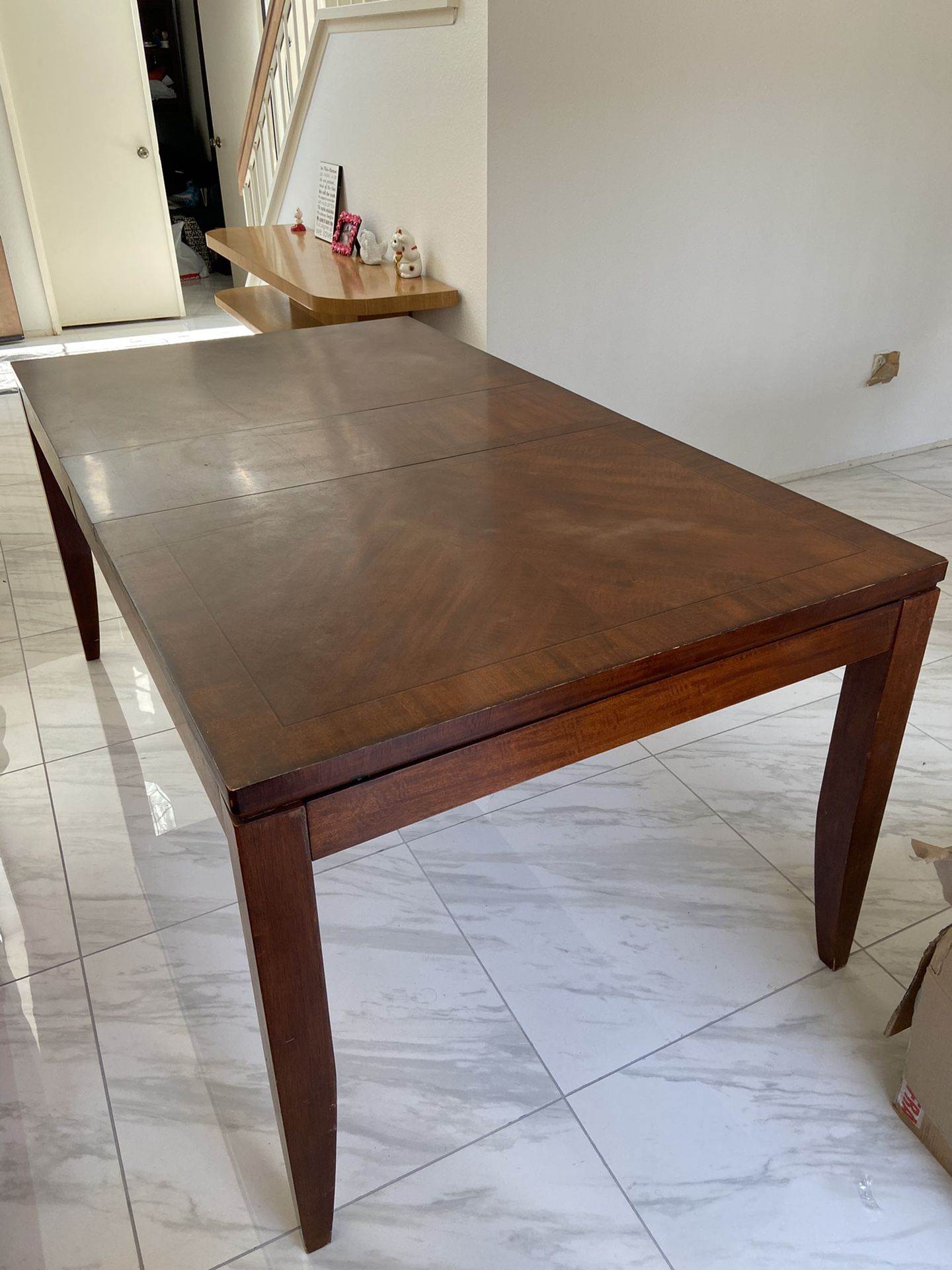 Dining table with extender