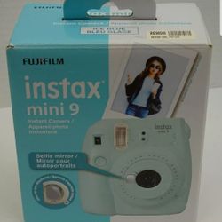 New ..Open Box...INSTAX MINI 9 CAMERA...NEGOTIABLE..MAKE OFFER