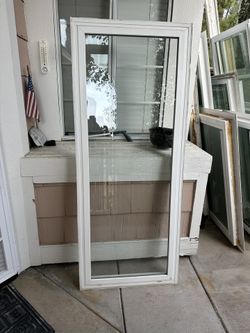 Double paint retrofit window