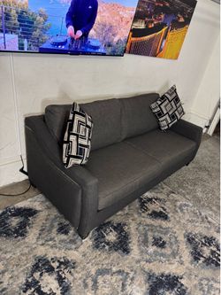 * Like New * Ashley furniture 1pc gray modular sofa ( Free Delivery )