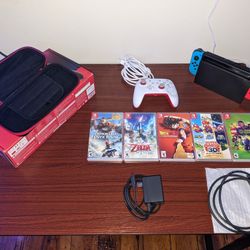 Nintendo Switch W/h Games, Mario Controller, And Travel Case! (Local Pick-Up)