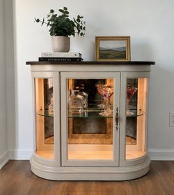Vintage Lighted Curio Cabinet with Curved Glass – Gordon’s Furniture