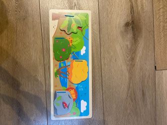Wooden peekaboo jungle animal board