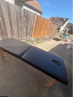 Massage table