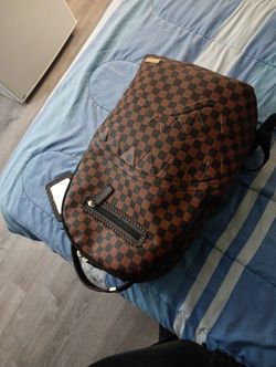 Sprayground Backpack.