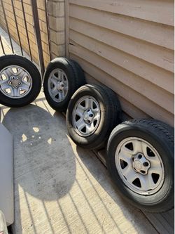 1st Gen Tacoma Wheels ( New front tires )