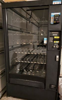 Vending machine with tap to pay and card reader