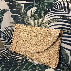 Elegant tan woven clutch