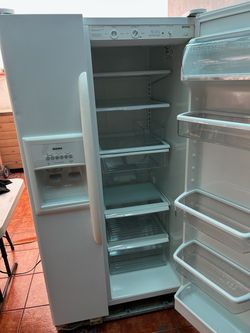 Kenmore Side-by-Side Refrigerator with Ice and Water Dispenser
