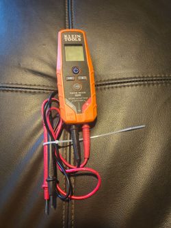 The highlighted tool is the Klein Tools ET250 AC/DC Voltage/Continuity Tester, a digital meter
