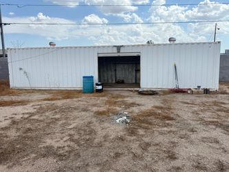 40’ CONEX / STORAGE CONTAINER with roof, turbine vents and side garage door