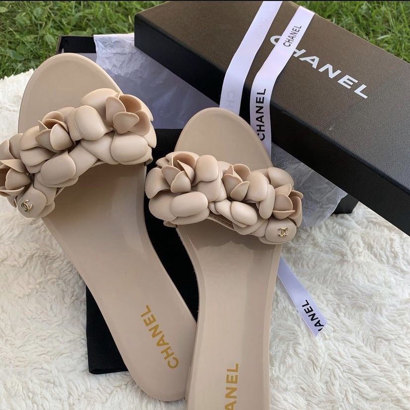 CHANEL PVC SLIDES WITH CAMELLIA FLOWERS BEIGE for Sale in Ponte Vedra  Beach, FL - OfferUp