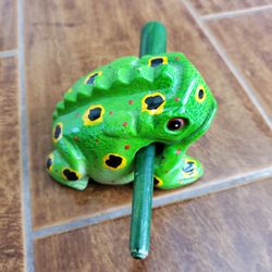 Wooden frog instrument.