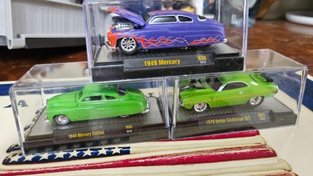 New (×3) diecast metal w/casing, M2 1949 Mercury Custom, firm.
