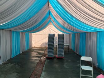 Tent,resin chairs,drape