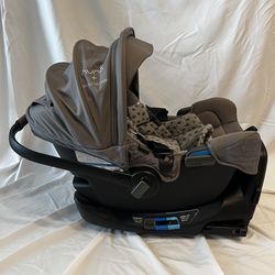 Car seat and Base. Nuna Pipa RX. Infant. Baby. Used. Clean.