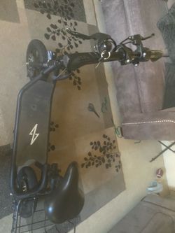 Seated phantom eletric scooter
