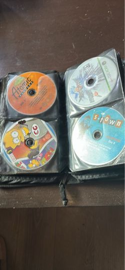 Mixed CD/DVD Lot in Zipper Binder Case