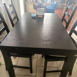Ikea Black/brown Dining Table With 4 Chairs