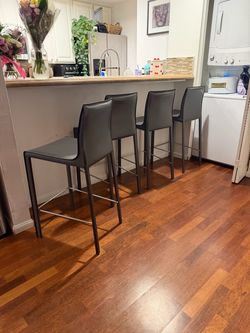 4 Grey leather bar stools