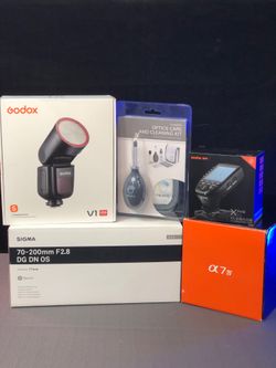 a7 IV Sony with Sigma 70-200mm f/2.8 DG DN OS Sports Lens,  Godox V1, Trigger and Cleaning Kit Pro-Bundle