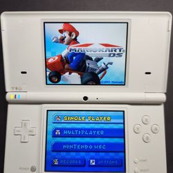 NINTENDO DSI COMPLETE WITH STYLUS AND CHARGER