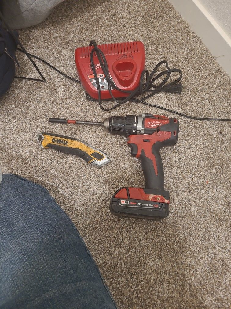 Milwaukee drill and charger
