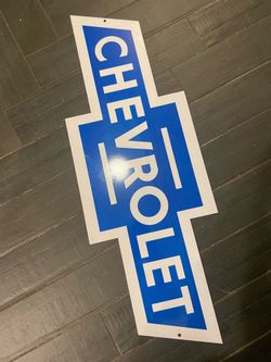 Vintage Chevy blue and white bow tie sign