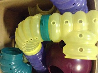 Box of giant critter play tubes and funnels