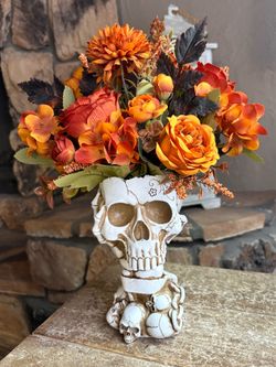 Ht-13.5in width-13.5in HANDMADE artificial skeleton vase / orange flowers