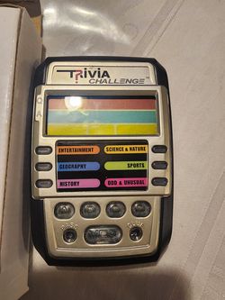 Vintage handheld trivia game new in box, works!