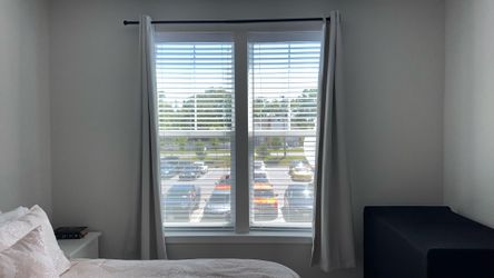 Set of 2 black out curtains and rod