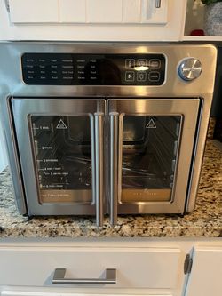 Brand new Emeril Lagasse French Door Air Fryer Oven
