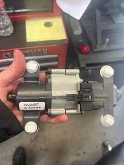 2001-2010 Caravan/Town & Country sliding door motor. (contact info removed)AB
