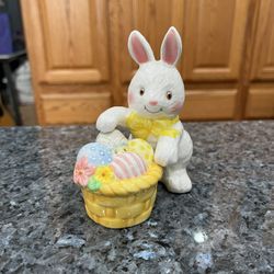 Ceramic Fitz & Floyd Easter Bunny with a Basket Pair of Salt and Pepper Shakers.  Preowned.  Has been on display in a cabinet with a very large salt a
