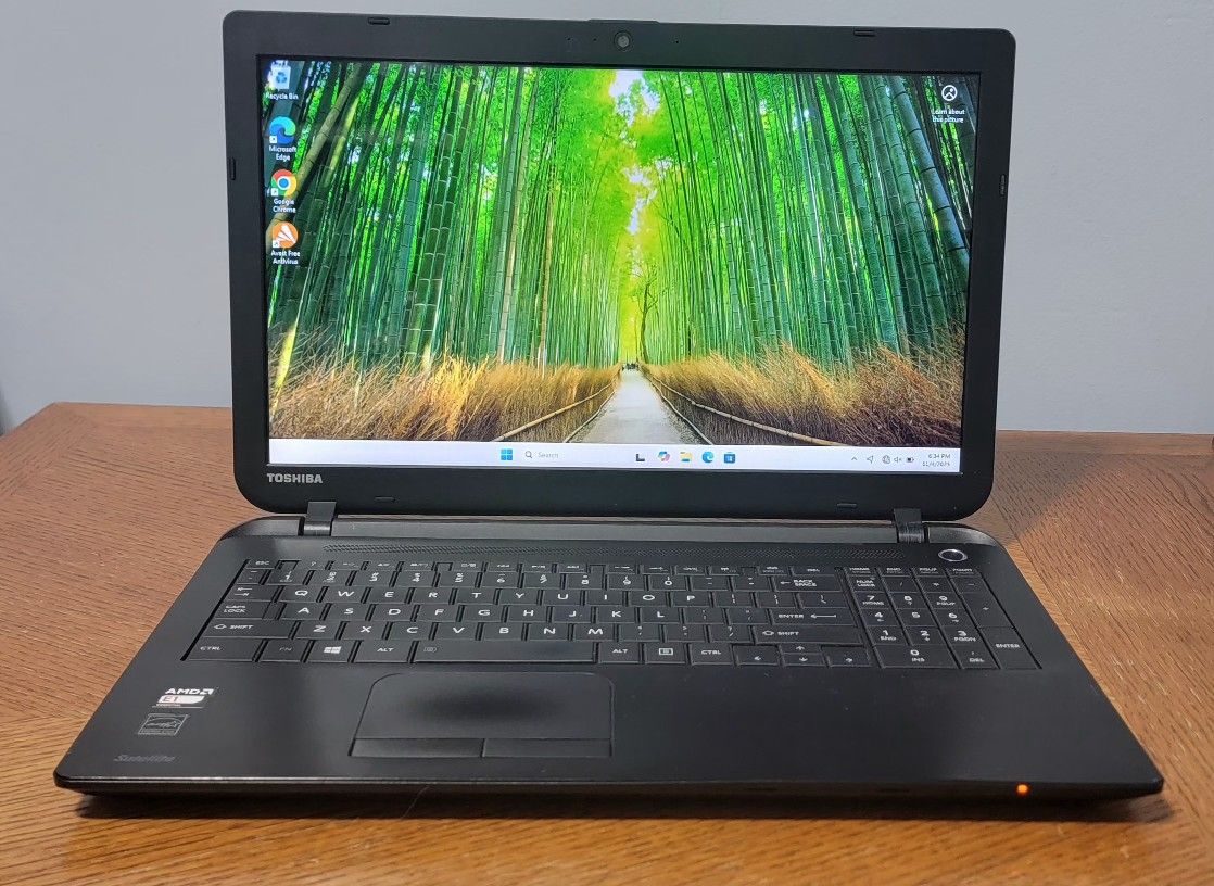 Toshiba Laptop – AMD E1-2100 APU..READ DISCRETION(USED NOT FOR GAMING )