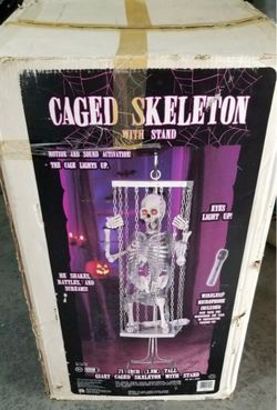 Gemmy life size cage Skeleton Halloween prop