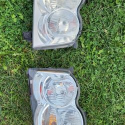 Headlight For 2009 Jeep Grand Cherokee  $50 For Both 