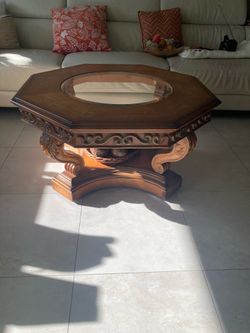 Coffee table with glass on casters