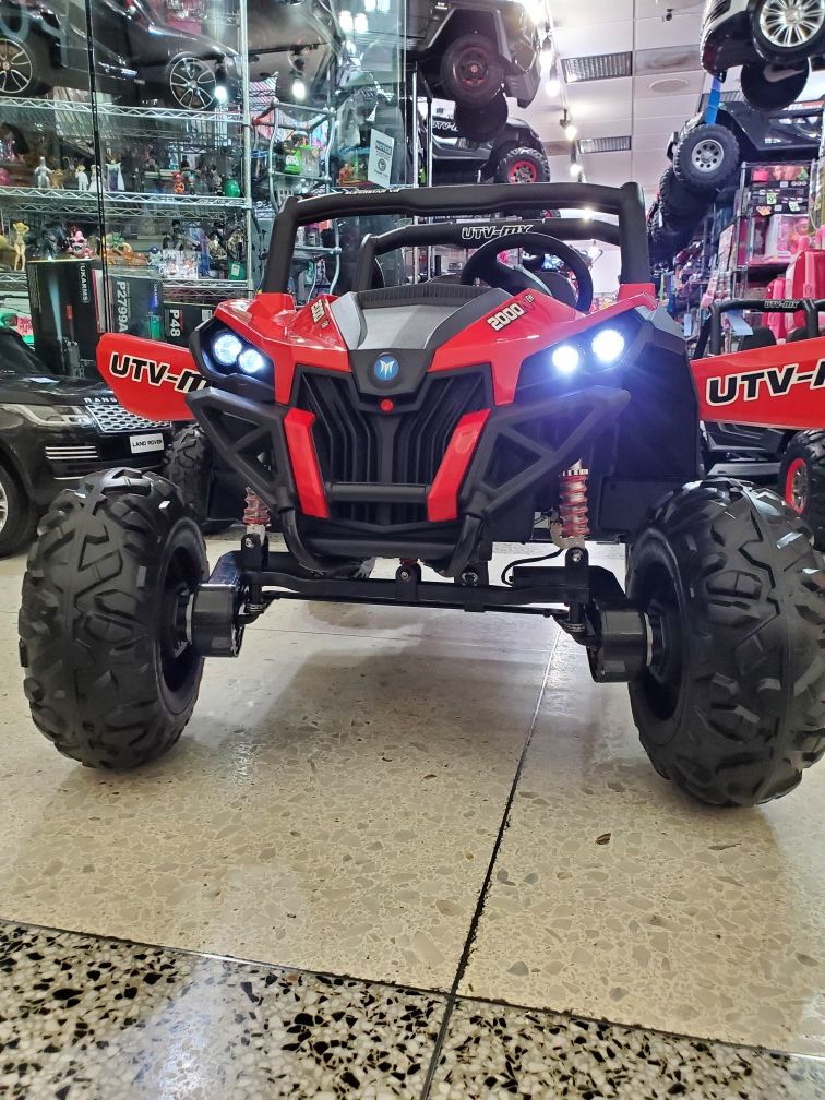 Utv 4x4 Remote control leather seats screen for videos shocks soft tires 6mph