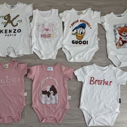 Bundle includes 6 baby pieces in 66–73cm (fits approx. 3–9 months) — mostly short-sleeve bodysuits/onesies, as shown in photos.  Also included: 	•	2 p