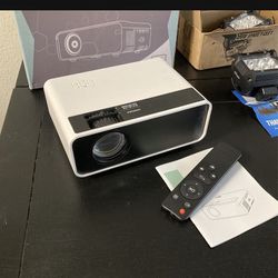 Great Working Projector For Netflix YouTube Movies And More. Comes With Original Box And Remote 