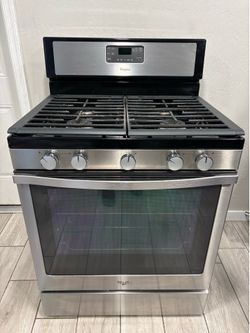 Whirlpool gas stove, 30 inch works Perfect and good condition. Free delivery garage.