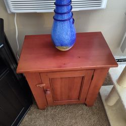 ($25) Cherry Wood Colored Nightstand With Storage